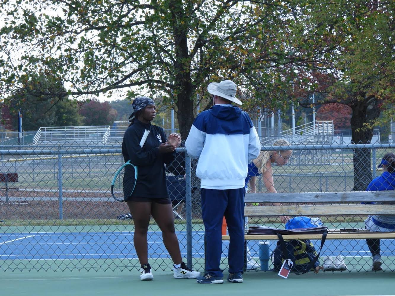 Jenny Nelson with Coach Alter on court 